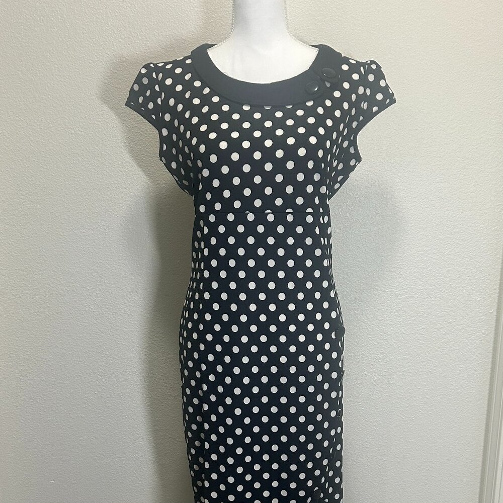 Oxiuli vintage inspired black and white polka dot dress with flutter hem